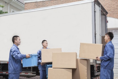 Local removals team planning a move in New Eltham residential street