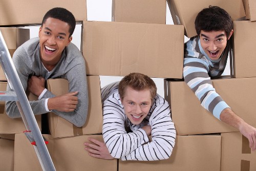 Local removals team helping with boxes and household items