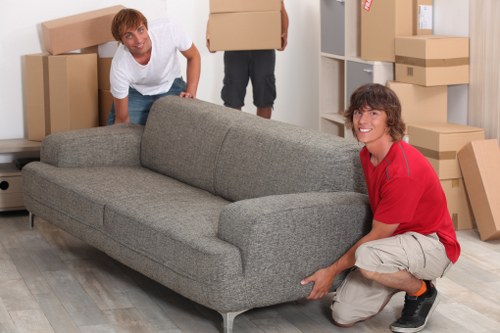 Packers handling household belongings for a move in New Eltham