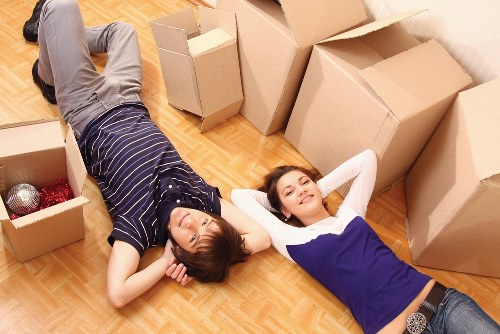 Packed moving boxes and household items ready for removal in New Eltham